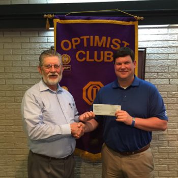 DTOC President Daniel Stewart Presents A Check To James W. Rainey, Newspapers In Education